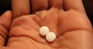 Services Woman Holding The Abortion Pill